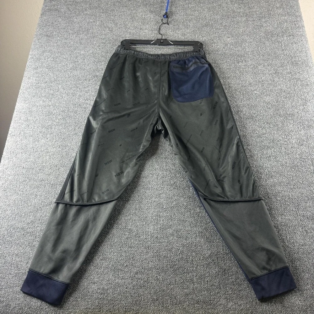 Nike Jogger Pants Mens L Blue Knit Colorblock Elastic Waist Pockets NSW Patch